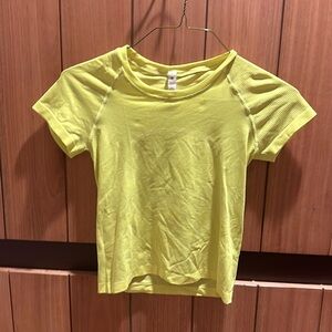 Women’s yellow Lululemon workout shirt size 6